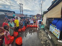 BRI Salurkan Bantuan Bagi Warga Terdampak Banjir di Manado
