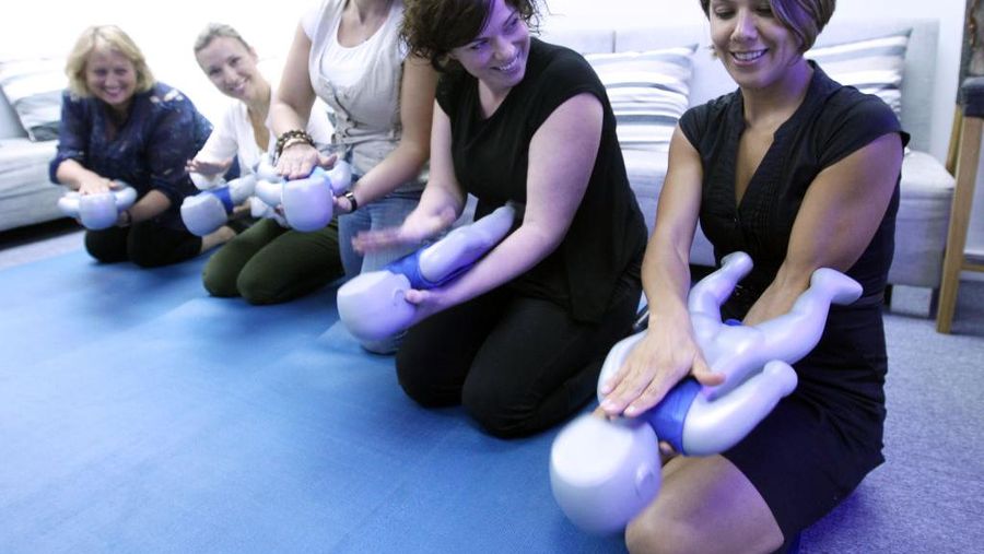 Baby CPR class at Annerley with CPR instructor sleep consultant Joyce Moir Edmondson (right). 27MAR13 (Photo by Jonathan Wong/South China Morning Post via Getty Images)
