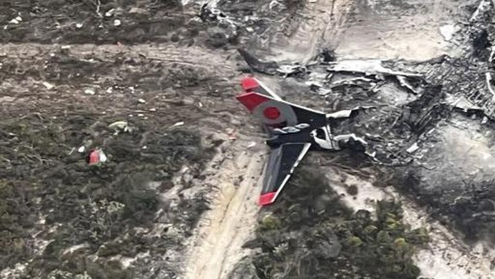 AUSTRALIA-ACCIDENT-FIRE A handout photo taken on February 7, 2023 and received on February 8 from the West Australian Department of Fire and Emergency Services shows the burnt out wreackage of Boeing 737 water-bombing plane which crashed and burned while fighting a blaze 460kms southeast of the West Australian city of Perth. (Photo by Handout / WEST AUSTRALIAN DEPARTMENT OF FIRES AND EMERGENCY SERVICES / AFP) / ----EDITORS NOTE ----RESTRICTED TO EDITORIAL USE MANDATORY CREDIT