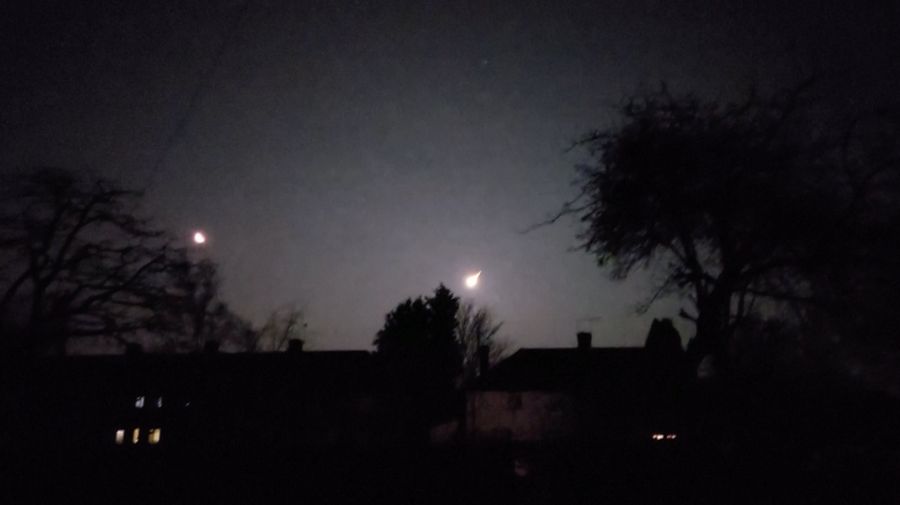 A view of a small asteroid passing through Earth's atmosphere in Brighton, Britain February 13, 2023 in this screen grab obtained from a social media video. Twitter/@KadeFlowers/via REUTERS)