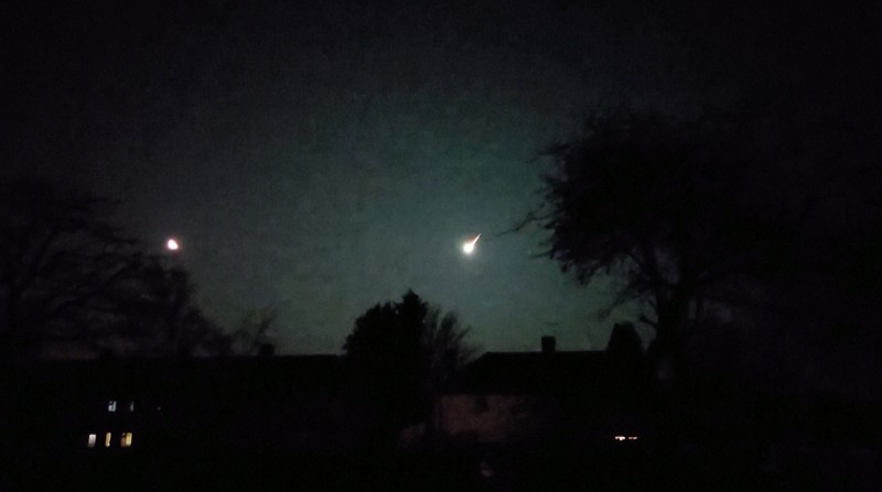 A view of a small asteroid passing through Earth's atmosphere in Brighton, Britain February 13, 2023 in this screen grab obtained from a social media video. Twitter/@KadeFlowers/via REUTERS)