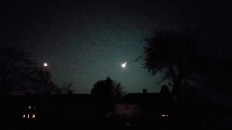 A view of a small asteroid passing through Earth's atmosphere in Brighton, Britain February 13, 2023 in this screen grab obtained from a social media video. Twitter/@KadeFlowers/via REUTERS)