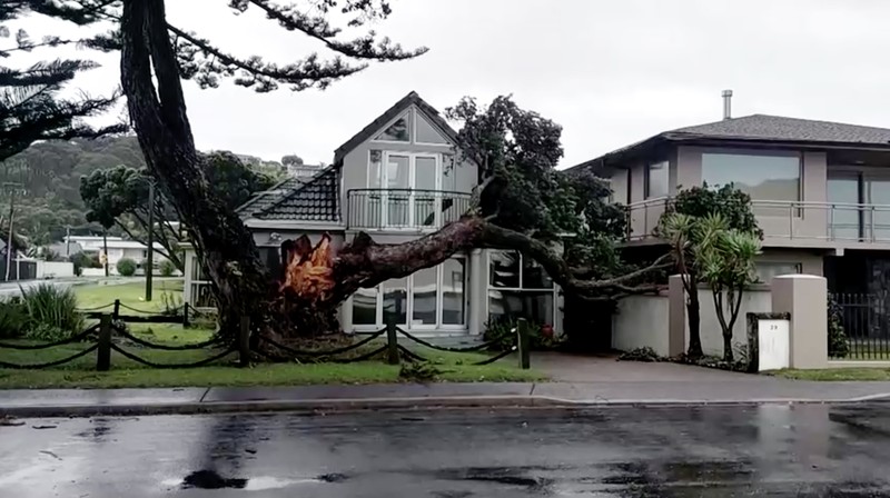 AUCKLAND, NEW ZEALAND - FEBRUARY 13: People out looking at the effects of Cyclone Gabrielle at Mathesons Bay Beach on the Matakana Coast on February 13, 2023 in Auckland, New Zealand. Forecasters say Auckland residents are about halfway through the cyclone impacts, with a better weather forecast from Wednesday. (Photo by Fiona Goodall/Getty Images) on February 13, 2023 in Auckland, New Zealand.  (Photo by Fiona Goodall/Getty Images)