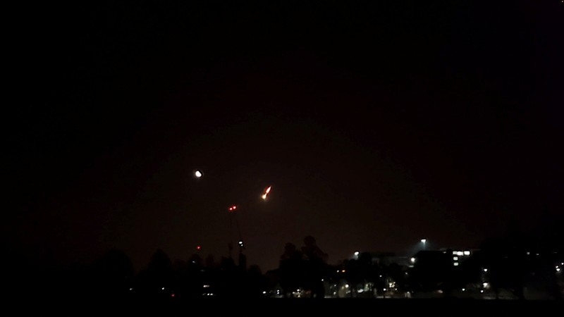 A view of a small asteroid passing through Earth's atmosphere in Brighton, Britain February 13, 2023 in this screen grab obtained from a social media video. Twitter/@KadeFlowers/via REUTERS)
