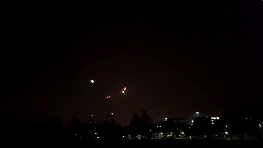 A view of a small asteroid passing through Earth's atmosphere in Brighton, Britain February 13, 2023 in this screen grab obtained from a social media video. Twitter/@KadeFlowers/via REUTERS)