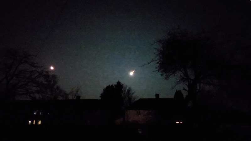 A view of a small asteroid passing through Earth's atmosphere in Brighton, Britain February 13, 2023 in this screen grab obtained from a social media video. Twitter/@KadeFlowers/via REUTERS)