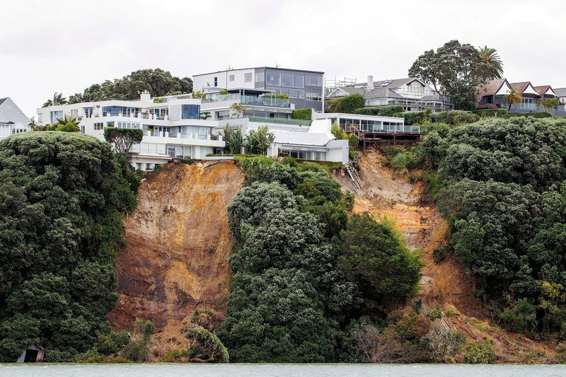 1465425529 AUCKLAND, NEW ZEALAND - FEBRUARY 13: People out looking at the effects of Cyclone Gabrielle at Mathesons Bay Beach on the Matakana Coast on February 13, 2023 in Auckland, New Zealand. Forecasters say Auckland residents are about halfway through the cyclone impacts, with a better weather forecast from Wednesday. (Photo by Fiona Goodall/Getty Images) on February 13, 2023 in Auckland, New Zealand. (Photo by Fiona Goodall/Getty Images)