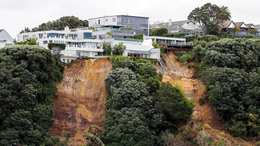 AUCKLAND, NEW ZEALAND - FEBRUARY 13: People out looking at the effects of Cyclone Gabrielle at Mathesons Bay Beach on the Matakana Coast on February 13, 2023 in Auckland, New Zealand. Forecasters say Auckland residents are about halfway through the cyclone impacts, with a better weather forecast from Wednesday. (Photo by Fiona Goodall/Getty Images) on February 13, 2023 in Auckland, New Zealand.  (Photo by Fiona Goodall/Getty Images)