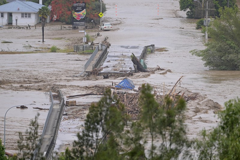 1465708074 NAPIER, NEW ZEALAND - FEBRUARY 14: The Waiohiki Bridge is washed away on February 14, 2023 in Napier, New Zealand. New Zealand has declared a national state of emergency with flooding and landslides devastating several communities. (Photo by Kerry Marshall/Getty Images)
