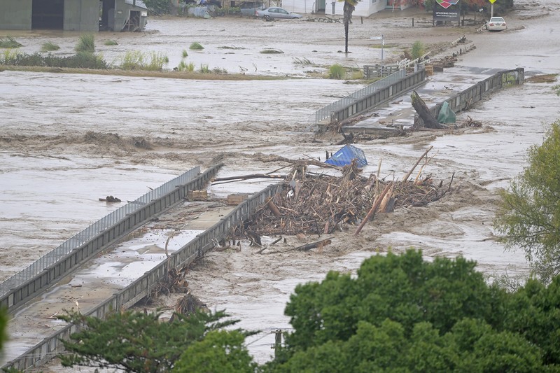 NAPIER, NEW ZEALAND - FEBRUARY 14: The Waiohiki Bridge is washed away on February 14, 2023 in Napier, New Zealand. New Zealand has declared a national state of emergency with flooding and landslides devastating several communities. (Photo by Kerry Marshall/Getty Images)