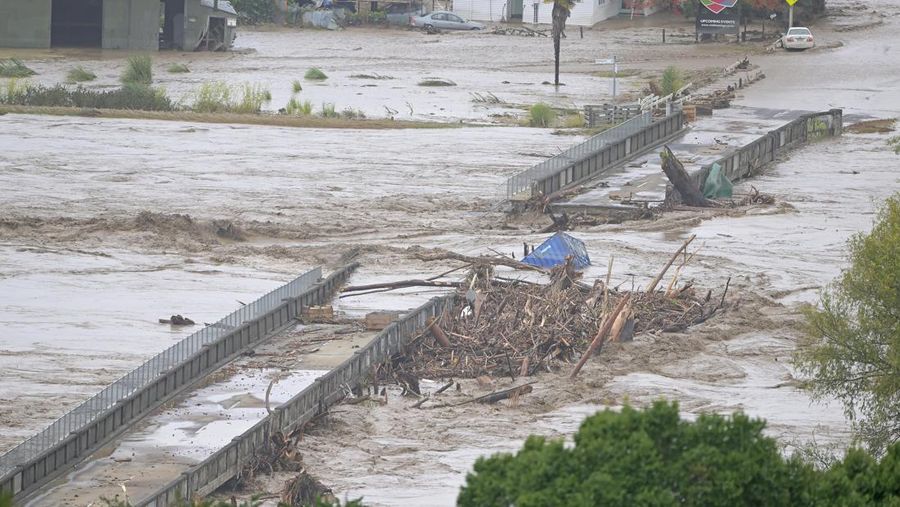 NAPIER, NEW ZEALAND - FEBRUARY 14: The Waiohiki Bridge is washed away on February 14, 2023 in Napier, New Zealand. New Zealand has declared a national state of emergency with flooding and landslides devastating several communities. (Photo by Kerry Marshall/Getty Images)