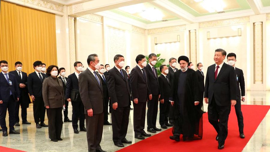 Iranian President Ebrahim Raisi stands next to Chinese President Xi Jinping during a welcoming ceremony in Beijing, China, February 14, 2023. Iran's President Website/WANA (West Asia News Agency)/Handout via REUTERS. ATTENTION EDITORS - THIS PICTURE WAS PROVIDED BY A THIRD PARTY.