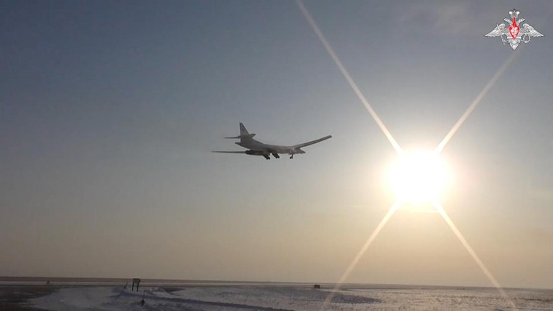A Russian Tu-95MS strategic bomber performs a flight over the neutral waters of the Bering Sea, in this still image taken from a handout video released February 14, 2023. Russian Defence Ministry/Handout via REUTERS ATTENTION EDITORS - THIS IMAGE WAS PROVIDED BY A THIRD PARTY. NO RESALES. NO ARCHIVES. MANDATORY CREDIT.