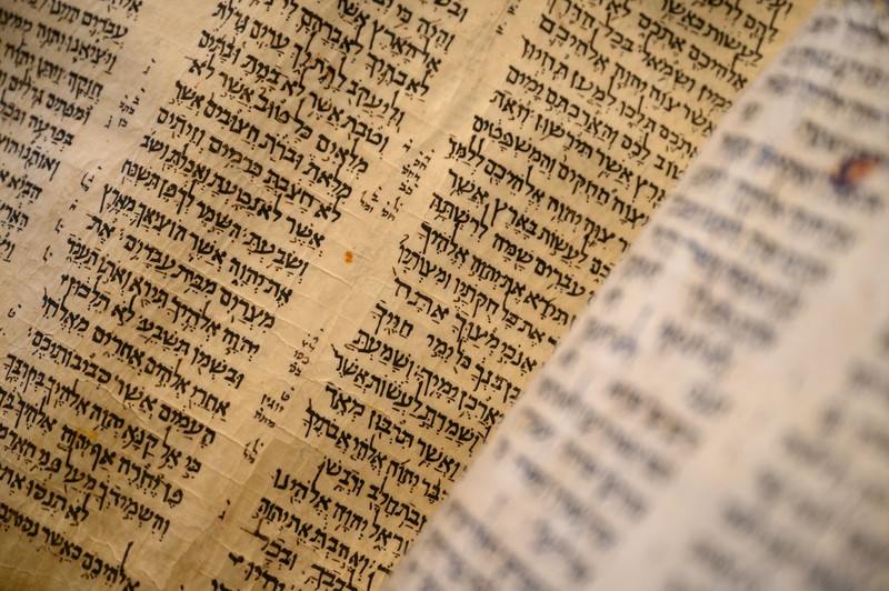 NEW YORK, NEW YORK - FEBRUARY 15:  A view of the Codex Sassoon at Sotheby's on February 15, 2023 in New York City. The codex is the oldest surviving Hebrew Bible or Tanakh as its used today in contrast to the dead sea scrolls which are older but the books are in separate scrolls. The Book is approximately 1000 years old and is estimated to be auctioned at 30-50 Million dollars and that would make it the most valuable historical document to appear in auction. (Photo by Roy Rochlin/Getty Images)