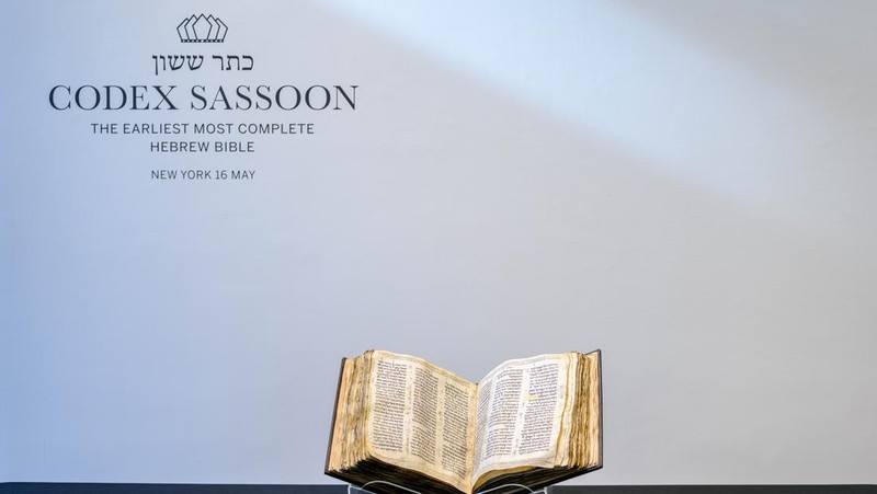 NEW YORK, NEW YORK - FEBRUARY 15:  A view of the Codex Sassoon at Sotheby's on February 15, 2023 in New York City. The codex is the oldest surviving Hebrew Bible or Tanakh as its used today in contrast to the dead sea scrolls which are older but the books are in separate scrolls. The Book is approximately 1000 years old and is estimated to be auctioned at 30-50 Million dollars and that would make it the most valuable historical document to appear in auction. (Photo by Roy Rochlin/Getty Images)