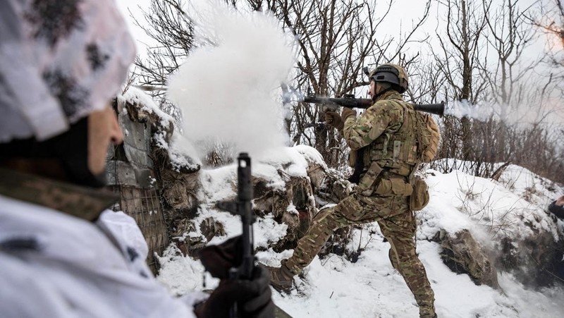Ukrainian service members fire a SPG-9 anti-tank grenade launcher toward Russian troops in the frontline town of Bakhmut, amid Russia’s attack on Ukraine, in Donetsk region, Ukraine, in this handout picture released February 13, 2023. Iryna Rybakova/Press Service of the 93rd Independent Kholodnyi Yar Mechanized Brigade of the Ukrainian Armed Forces/Handout via REUTERS ATTENTION EDITORS - THIS IMAGE HAS BEEN SUPPLIED BY A THIRD PARTY.
