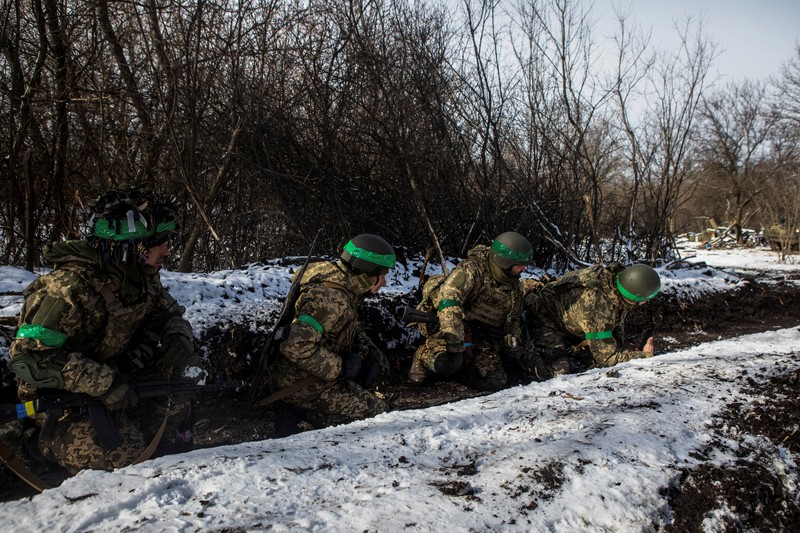 UKRAINE-CRISIS/BAKHMUT Ukrainian service members fire a SPG-9 anti-tank grenade launcher toward Russian troops in the frontline town of Bakhmut, amid Russia’s attack on Ukraine, in Donetsk region, Ukraine, in this handout picture released February 13, 2023. Iryna Rybakova/Press Service of the 93rd Independent Kholodnyi Yar Mechanized Brigade of the Ukrainian Armed Forces/Handout via REUTERS ATTENTION EDITORS - THIS IMAGE HAS BEEN SUPPLIED BY A THIRD PARTY.