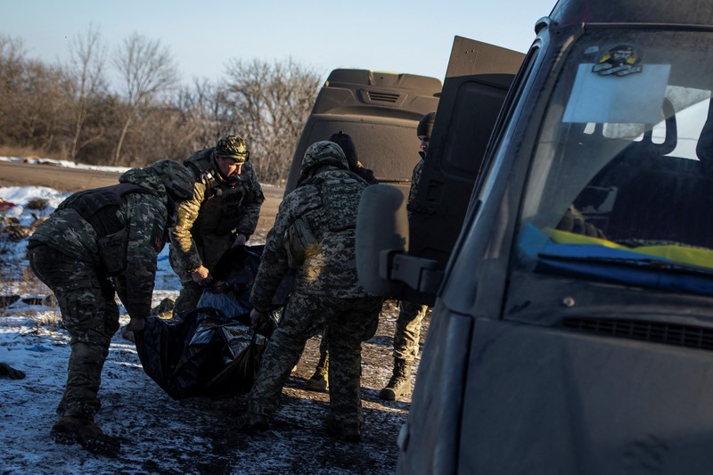 Ukrainian service members fire a SPG-9 anti-tank grenade launcher toward Russian troops in the frontline town of Bakhmut, amid Russia’s attack on Ukraine, in Donetsk region, Ukraine, in this handout picture released February 13, 2023. Iryna Rybakova/Press Service of the 93rd Independent Kholodnyi Yar Mechanized Brigade of the Ukrainian Armed Forces/Handout via REUTERS ATTENTION EDITORS - THIS IMAGE HAS BEEN SUPPLIED BY A THIRD PARTY.