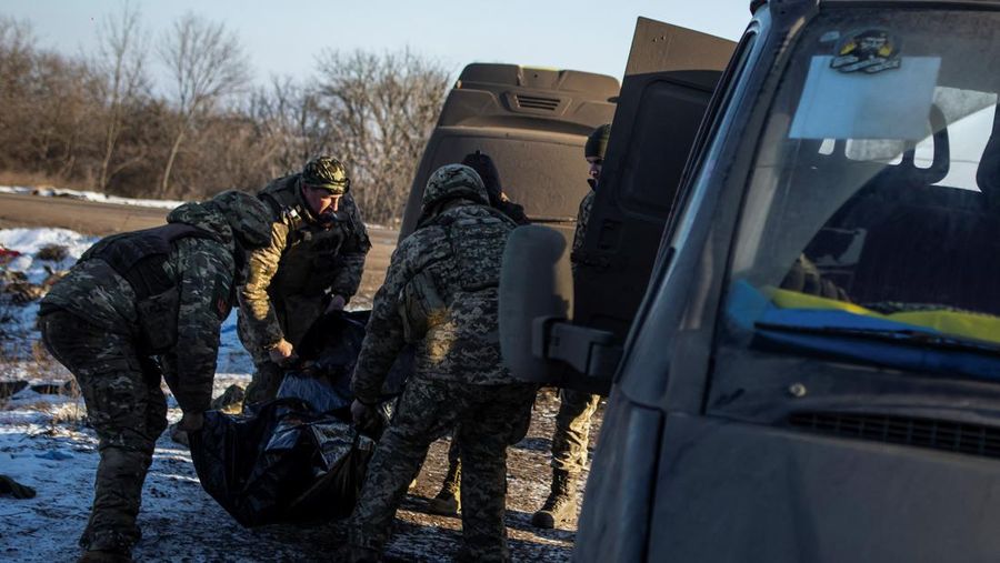 Ukrainian service members fire a SPG-9 anti-tank grenade launcher toward Russian troops in the frontline town of Bakhmut, amid Russia’s attack on Ukraine, in Donetsk region, Ukraine, in this handout picture released February 13, 2023. Iryna Rybakova/Press Service of the 93rd Independent Kholodnyi Yar Mechanized Brigade of the Ukrainian Armed Forces/Handout via REUTERS ATTENTION EDITORS - THIS IMAGE HAS BEEN SUPPLIED BY A THIRD PARTY.