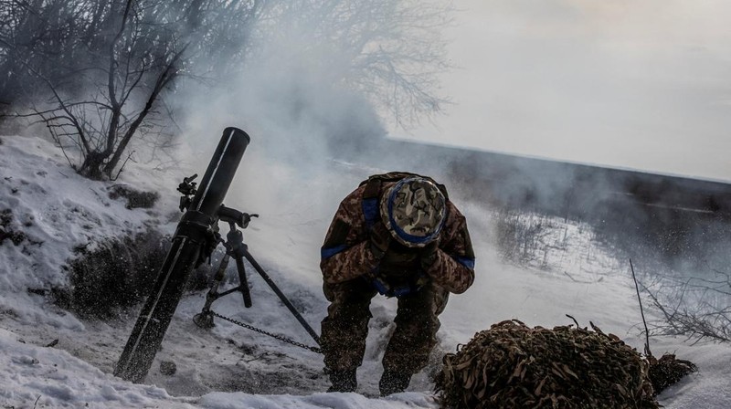 Ukrainian service members fire a SPG-9 anti-tank grenade launcher toward Russian troops in the frontline town of Bakhmut, amid Russia’s attack on Ukraine, in Donetsk region, Ukraine, in this handout picture released February 13, 2023. Iryna Rybakova/Press Service of the 93rd Independent Kholodnyi Yar Mechanized Brigade of the Ukrainian Armed Forces/Handout via REUTERS ATTENTION EDITORS - THIS IMAGE HAS BEEN SUPPLIED BY A THIRD PARTY.