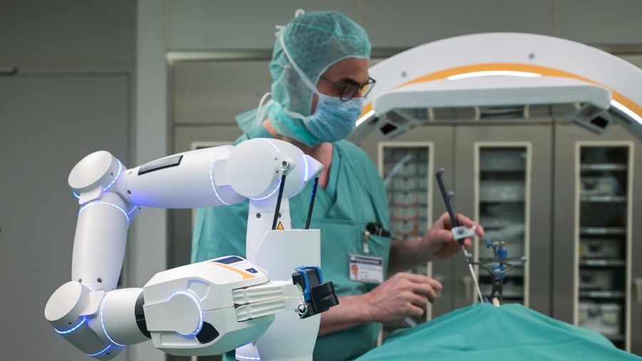 15 February 2023, Saxony-Anhalt, Halle (Saale): A robotic arm as a new assistant in the operating room. The Bergmannstrost Hospital in Halle is putting a new robotic surgical operating system into operation. It also features a 3D imaging robot and a digital navigation system. Photo: Heiko Rebsch/dpa (Photo by Heiko Rebsch/picture alliance via Getty Images)