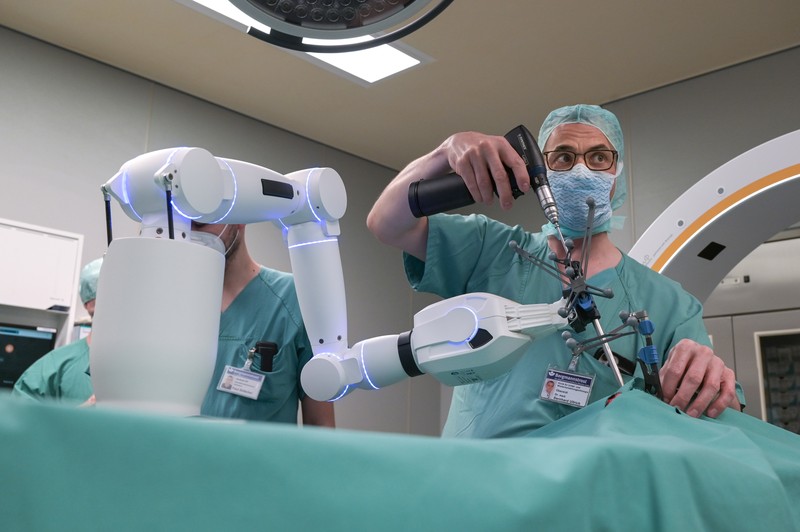 15 February 2023, Saxony-Anhalt, Halle (Saale): A robotic arm as a new assistant in the operating room. The Bergmannstrost Hospital in Halle is putting a new robotic surgical operating system into operation. It also features a 3D imaging robot and a digital navigation system. Photo: Heiko Rebsch/dpa (Photo by Heiko Rebsch/picture alliance via Getty Images)