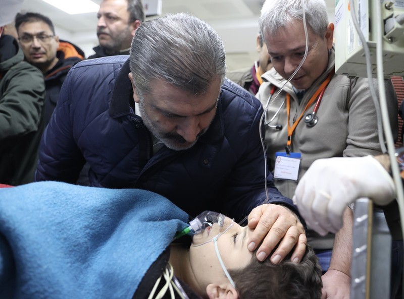 Members of the Polis Arama Kurtarma (PAK) work as they rescue a 12-year-old boy from the rubble of a collapsed building, in the aftermath of a deadly earthquake, in Hatay, Turkey February 17, 2023, in this still image obtained from a social media video. Courtesy of Turkish Police Service via Twitter/via REUTERS  THIS IMAGE HAS BEEN SUPPLIED BY A THIRD PARTY. MANDATORY CREDIT.