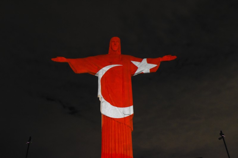 Patung Yesus Rio de Janeiro A lightning flashes over the statue of Christ the Redeemer on top of the Corcovado hill in Rio de Janeiro, Brazil, on January 16, 2014. AFP PHOTO / YASUYOSHI CHIBA (Photo credit should read YASUYOSHI CHIBA/AFP via Getty Images)