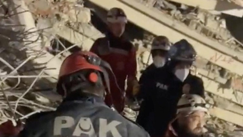Members of the Polis Arama Kurtarma (PAK) work as they rescue a 12-year-old boy from the rubble of a collapsed building, in the aftermath of a deadly earthquake, in Hatay, Turkey February 17, 2023, in this still image obtained from a social media video. Courtesy of Turkish Police Service via Twitter/via REUTERS  THIS IMAGE HAS BEEN SUPPLIED BY A THIRD PARTY. MANDATORY CREDIT.