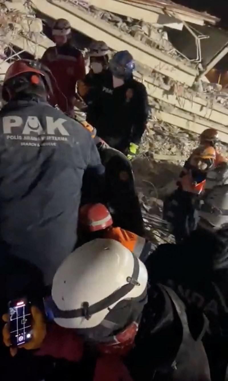 Members of the Polis Arama Kurtarma (PAK) work as they rescue a 12-year-old boy from the rubble of a collapsed building, in the aftermath of a deadly earthquake, in Hatay, Turkey February 17, 2023, in this still image obtained from a social media video. Courtesy of Turkish Police Service via Twitter/via REUTERS  THIS IMAGE HAS BEEN SUPPLIED BY A THIRD PARTY. MANDATORY CREDIT.