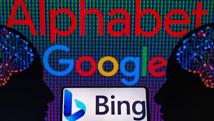 Google Alphabet displayed on screen with Bing on mobile seen in this photo illustration. On 17 February 2023 in Brussels, Belgium.(Photo illustration by Jonathan Raa/NurPhoto via Getty Images)