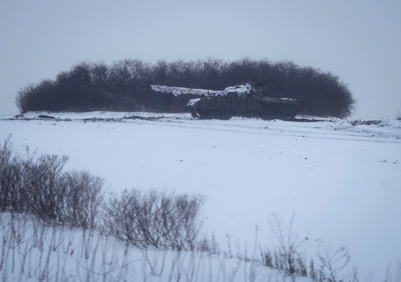UKRAINE-CRISIS/BAKHMUT-WARCRIMES FILE PHOTO: An explosion is seen on a road outside the frontline town of Bakhmut, amid Russia's attack on Ukraine, in Donetsk region, Ukraine February 10, 2023. REUTERS/Yevhenii Zavhorodnii/File Photo