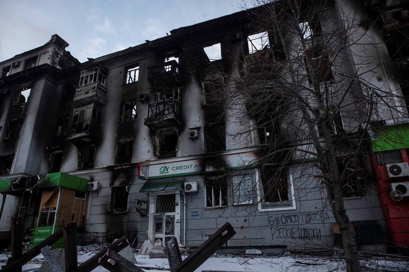 UKRAINE-CRISIS/BAKHMUT-WARCRIMES FILE PHOTO: An explosion is seen on a road outside the frontline town of Bakhmut, amid Russia's attack on Ukraine, in Donetsk region, Ukraine February 10, 2023. REUTERS/Yevhenii Zavhorodnii/File Photo