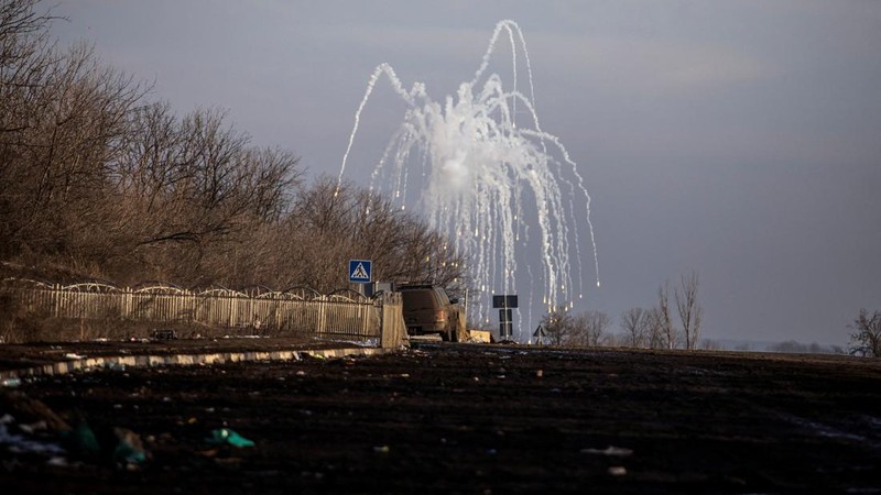 FILE PHOTO: An explosion is seen on a road outside the frontline town of Bakhmut, amid Russia's attack on Ukraine, in Donetsk region, Ukraine February 10, 2023. REUTERS/Yevhenii Zavhorodnii/File Photo