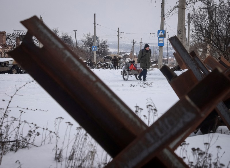 FILE PHOTO: An explosion is seen on a road outside the frontline town of Bakhmut, amid Russia's attack on Ukraine, in Donetsk region, Ukraine February 10, 2023. REUTERS/Yevhenii Zavhorodnii/File Photo