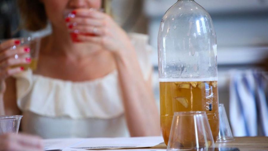 A woman drinks Kombucha as she attends a workshop by Fermentationist Cheryl Paswater in the Brooklyn borough of New York City, on June 29, 2019. - The recent kombucha craze has been fermenting for decades. All natural, low sugar, and packed with supposed health benefits, the once-niche drink has invaded grocery stores, supermarkets and cafes. Sales of the drink reached $412 million in the United States for 2018, according to Nielsen data, a 42 percent increase from the year before.
From the corner store to American retail giant Walmart, most shops sell kombucha. Some offer up to 10 different brands of the drink, whose exact origins are unknown. (Photo by Kena Betancur / AFP) (Photo credit should read KENA BETANCUR/AFP via Getty Images)