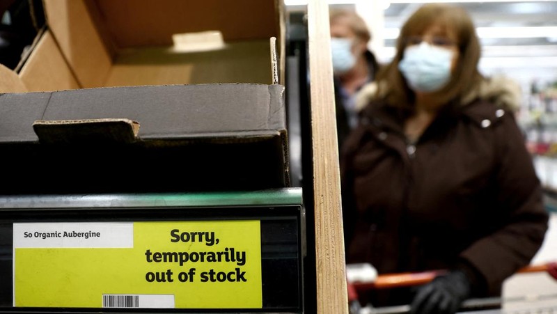 Empty boxes of vegetables are seen in Tesco, Hanley, Staffordshire, Britain, February 27, 2023. REUTERS/Carl Recine