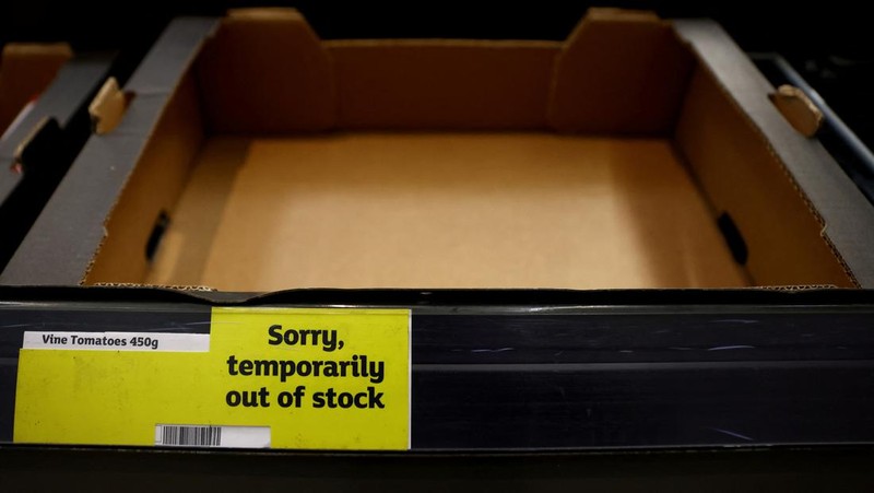 Empty boxes of vegetables are seen in Tesco, Hanley, Staffordshire, Britain, February 27, 2023. REUTERS/Carl Recine