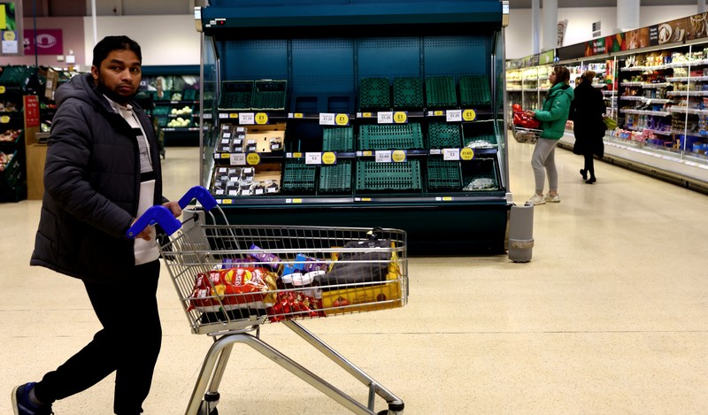 Empty boxes of vegetables are seen in Tesco, Hanley, Staffordshire, Britain, February 27, 2023. REUTERS/Carl Recine