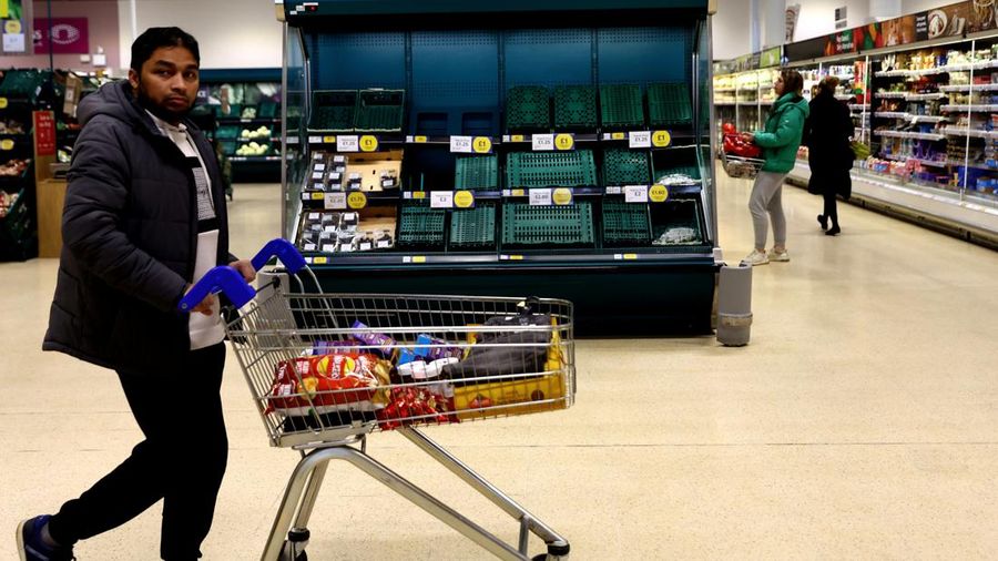 Empty boxes of vegetables are seen in Tesco, Hanley, Staffordshire, Britain, February 27, 2023. REUTERS/Carl Recine