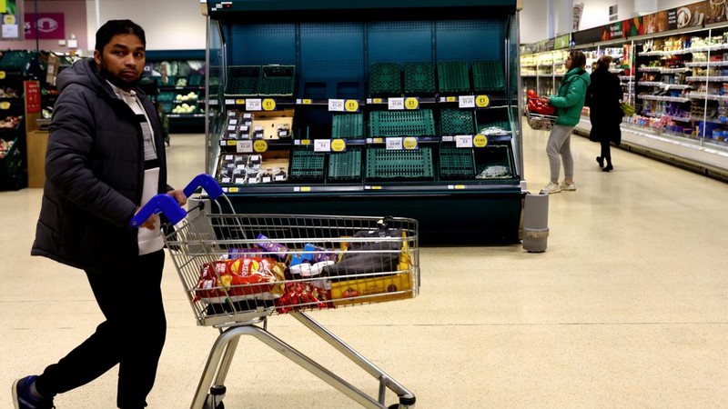 Empty boxes of vegetables are seen in Tesco, Hanley, Staffordshire, Britain, February 27, 2023. REUTERS/Carl Recine