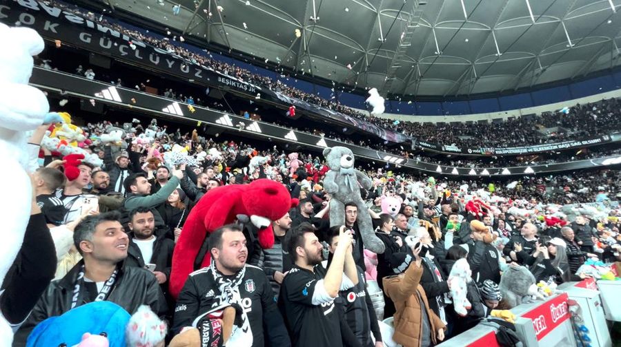 Fans throw toys on the pitch for children affected by earthquake during a Turkish Super League match between Besiktas and Antalyaspor at Vodafone Park in Istanbul, Turkey February 26, 2023. REUTERS/Stringer NO RESALES. NO ARCHIVES.