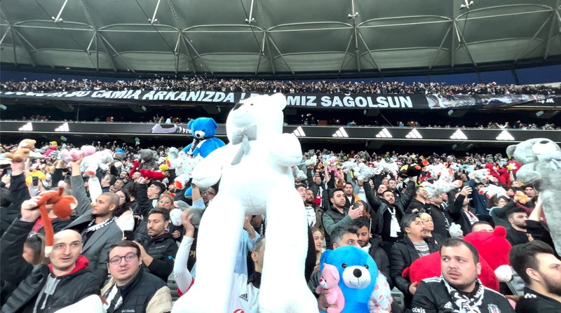 Fans throw toys on the pitch for children affected by earthquake during a Turkish Super League match between Besiktas and Antalyaspor at Vodafone Park in Istanbul, Turkey February 26, 2023. REUTERS/Stringer NO RESALES. NO ARCHIVES.