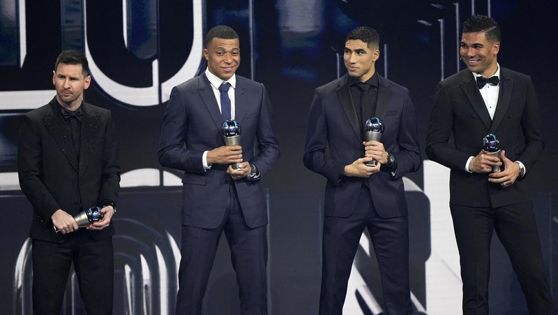 Argentina's Lionel Messi receives the Best FIFA Men's player award during the ceremony of the Best FIFA Football Awards in Paris, France, Monday, Feb. 27, 2023. (AP Photo/Michel Euler)