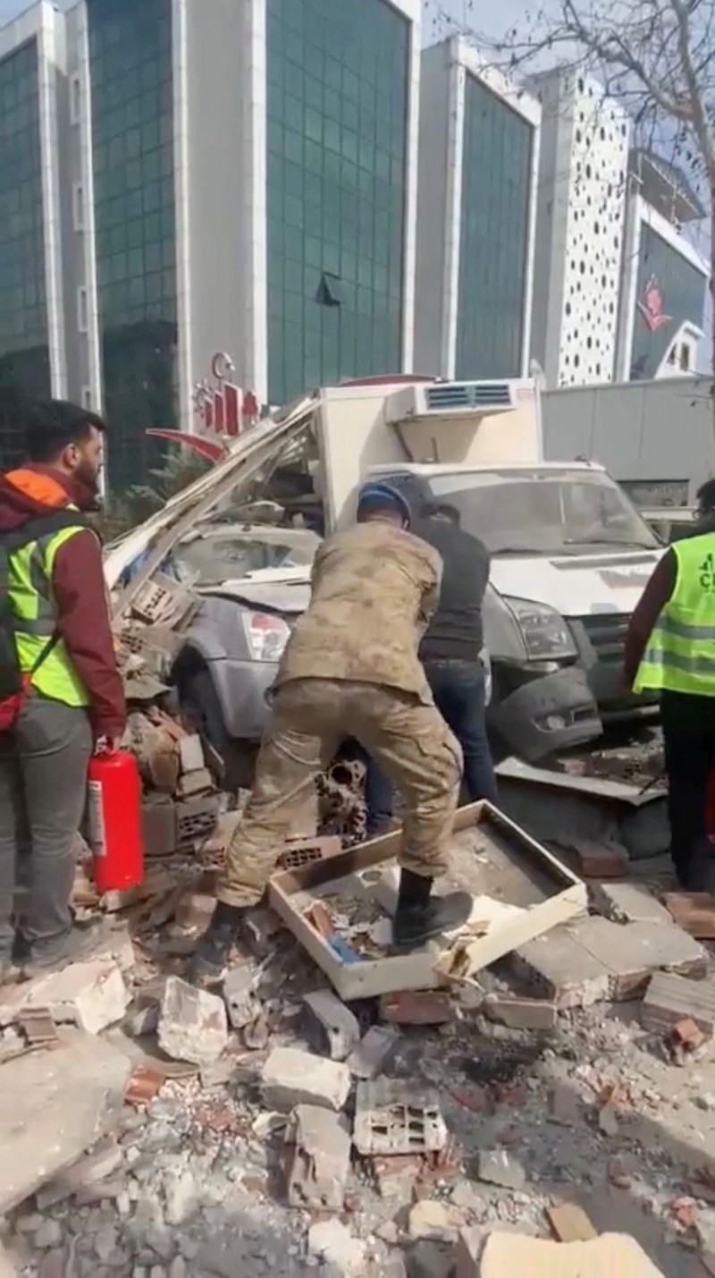 TURKEY-QUAKE/MALATYA Dust from collapsed buildings rise across Malatya after a new earthquake, in Turkey February 27, 2023, in this still image obtained from a social media video. Twitter/@Zarkusfb/via REUTERS THIS IMAGE HAS BEEN SUPPLIED BY A THIRD PARTY. MANDATORY CREDIT. NO RESALES. NO ARCHIVES.