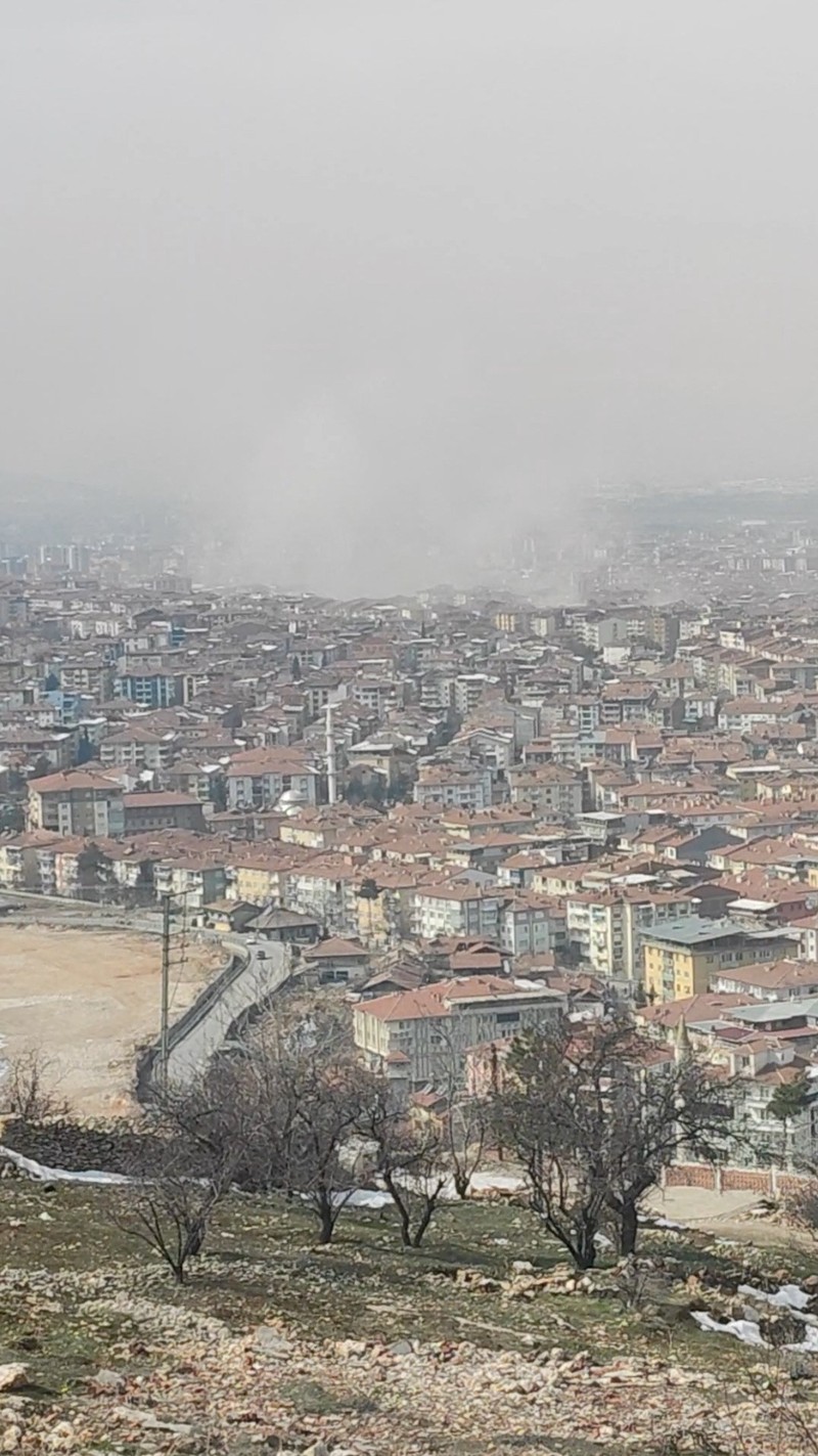 TURKEY-QUAKE/MALATYA Dust from collapsed buildings rise across Malatya after a new earthquake, in Turkey February 27, 2023, in this still image obtained from a social media video. Twitter/@Zarkusfb/via REUTERS THIS IMAGE HAS BEEN SUPPLIED BY A THIRD PARTY. MANDATORY CREDIT. NO RESALES. NO ARCHIVES.