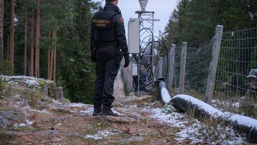 (FILES) In this file photo taken on November 18, 2022 Senior border guard officer Juho Pellinen stands near a fence marking the boundary between Finland and the Russian Federation near the border crossing of Pelkola, in Imatra, Finland on November 18, 2022. - Finland has started building its 200-kilometre fence on the Russian border, starting with a three-kilometre pilot fence at the southeastern border crossing in Imatra, the border guard said on February 28, 2023.
In total, Finland plans to fence 200 kilometres of its 1,300-kilometre border with Russia at a cost of around 380 million euros ($394 million). (Photo by Alessandro RAMPAZZO / AFP)