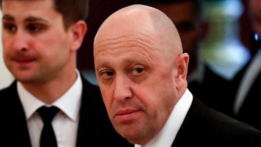 This picture taken on July 4, 2017 shows Russian businessman Yevgeny Prigozhin prior to a meeting with business leaders held by Russian and Chinese presidents at the Kremlin in Moscow. (Photo by Sergei ILNITSKY / POOL / AFP)