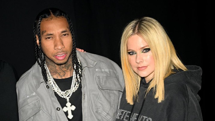 Avril Lavigne dan Tyga (Corbis via Getty Images/Stephane Cardinale - Corbis) Avril Lavigne dan Tyga (Corbis via Getty Images/Stephane Cardinale - Corbis)