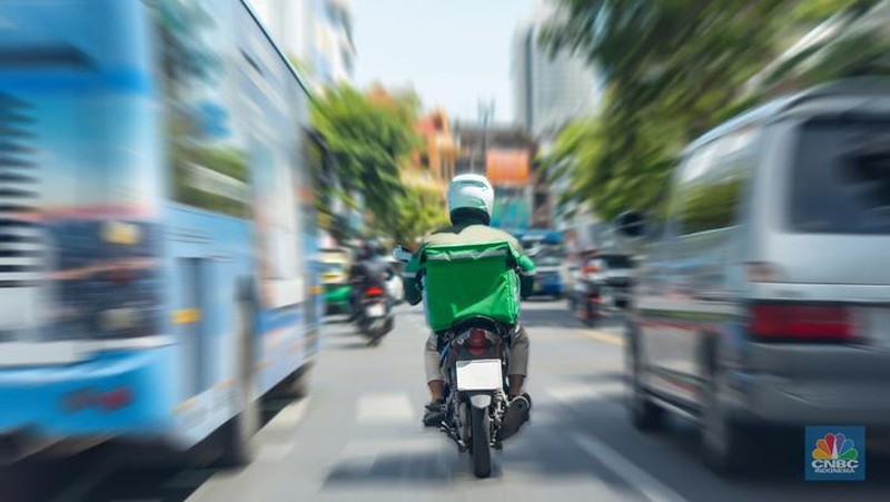 Ilustrasi aturan baru tarif ojek online. (CNBC Indonesia/Tri Susilo)
